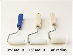 Plastic radius rollers on quick-change frame